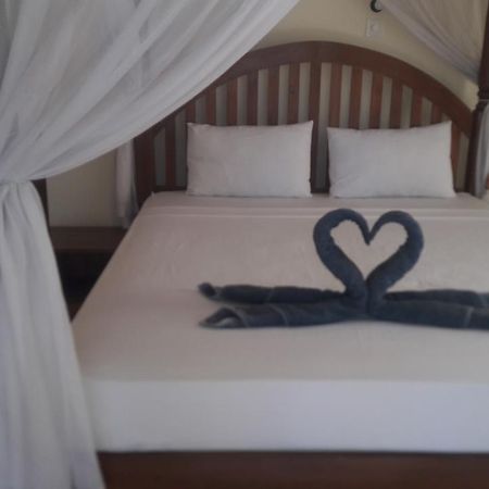Warung Pantai Bungalows Αμέντ Εξωτερικό φωτογραφία