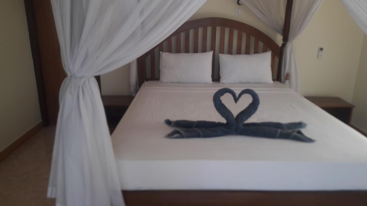 Warung Pantai Bungalows Αμέντ Εξωτερικό φωτογραφία