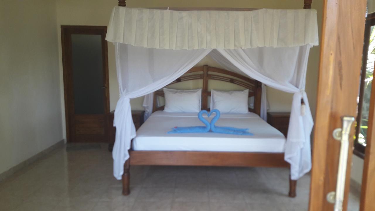 Warung Pantai Bungalows Αμέντ Εξωτερικό φωτογραφία